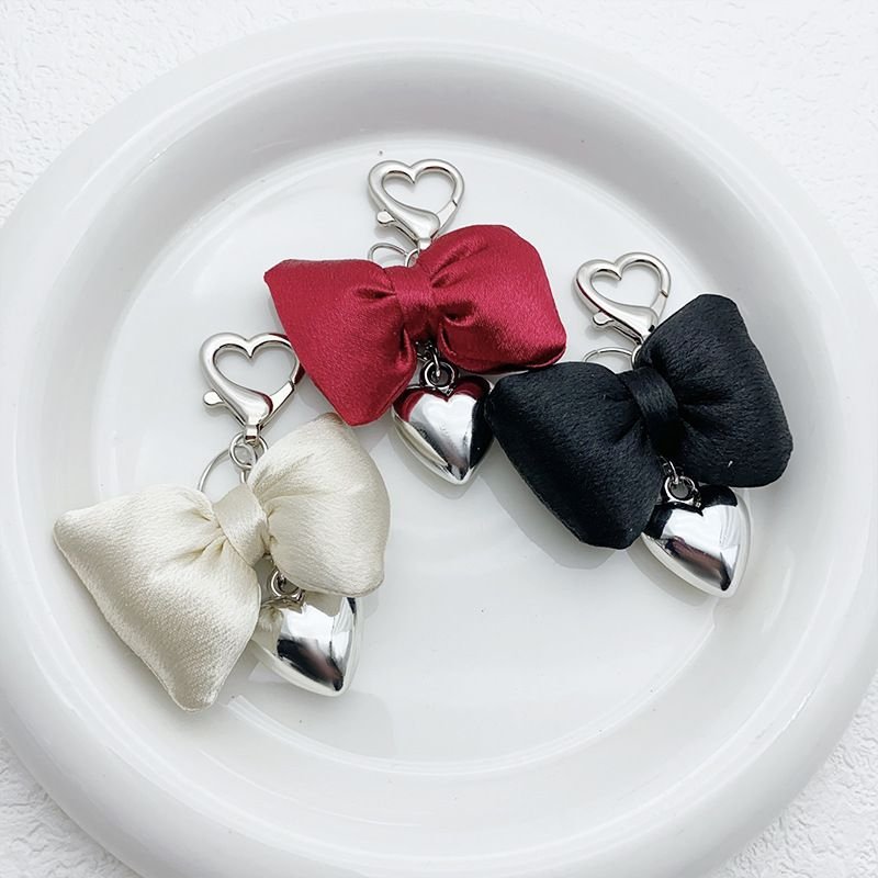 Women Fashion Simple Champagne Powder Three-Dimensional Bow Silver Metal Heart-Shaped Keychain