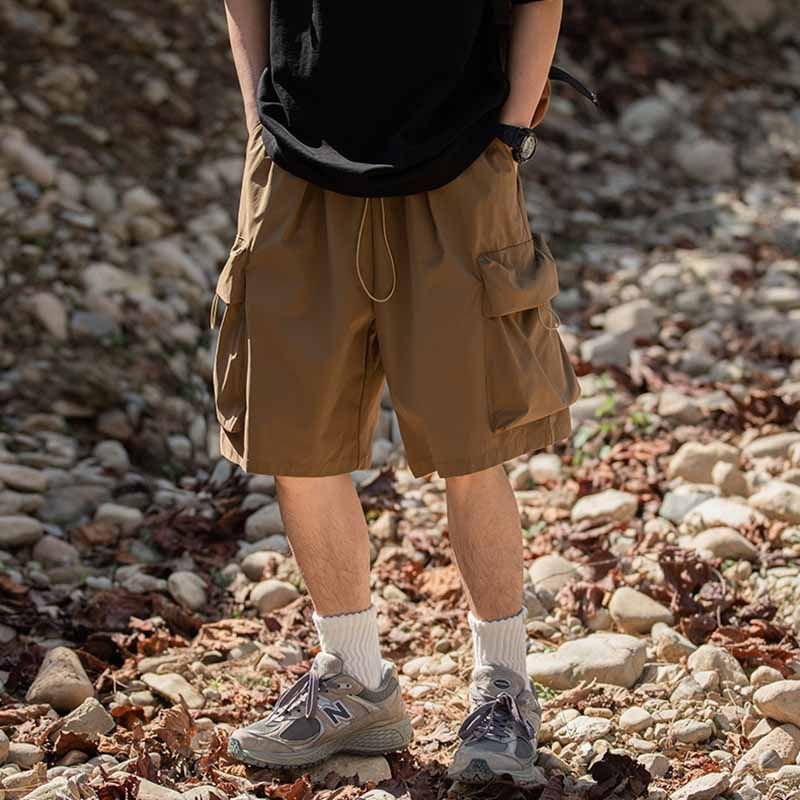 Men Casual Athleisure Solid Color Loose Drawstring Waist Cargo Shorts