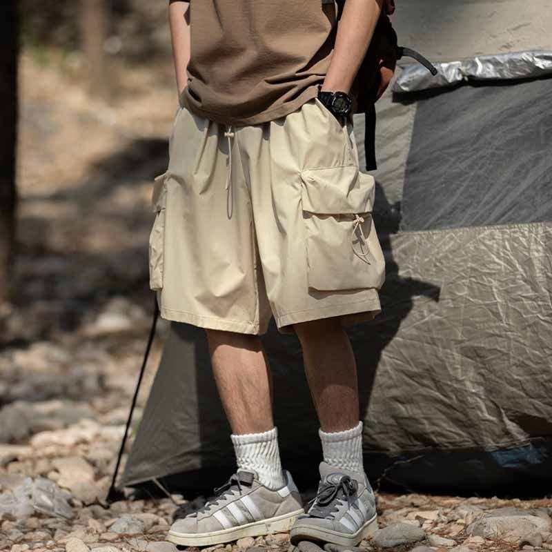 Men Casual Athleisure Solid Color Loose Drawstring Waist Cargo Shorts